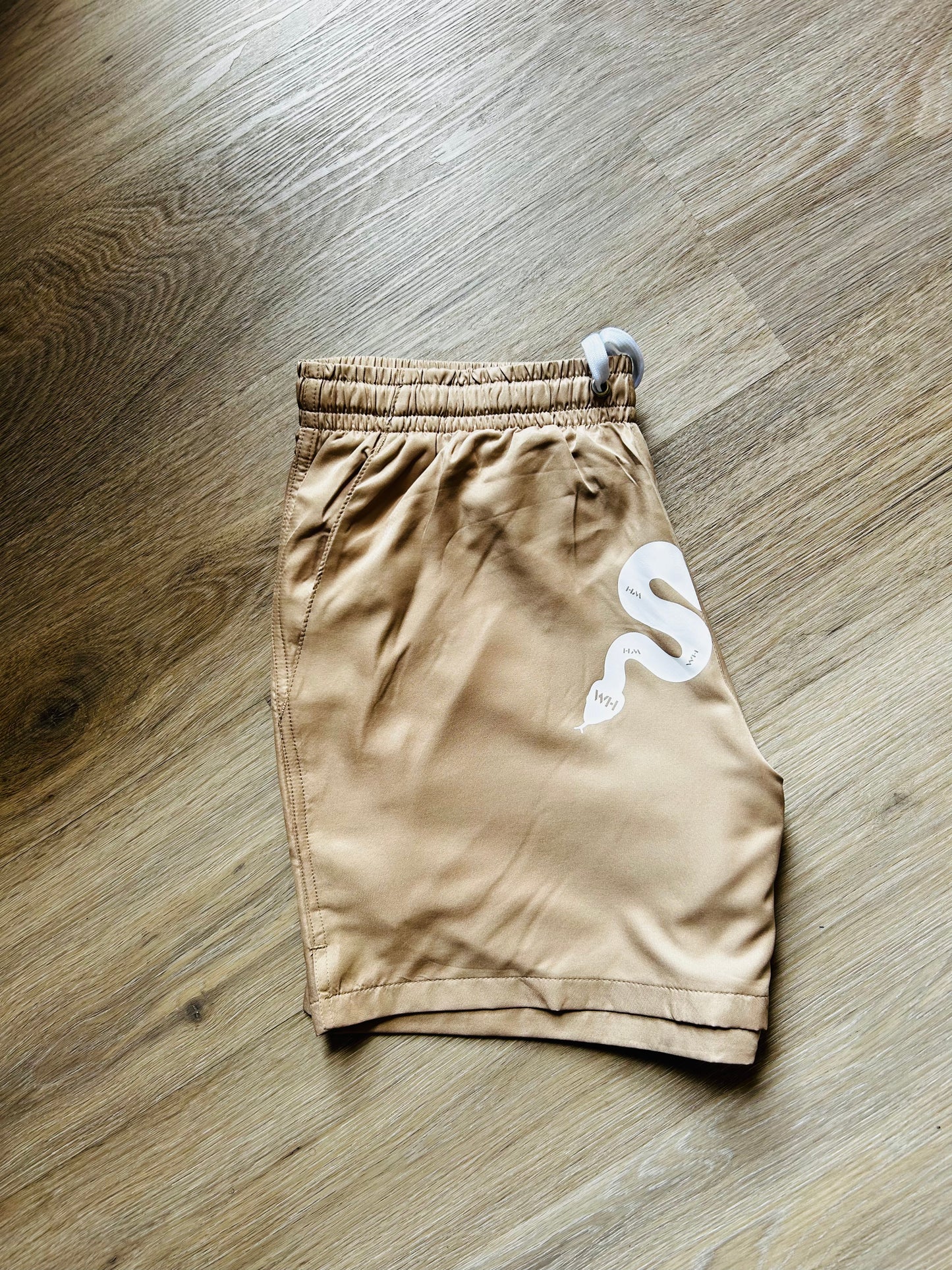 Tan snake shorts